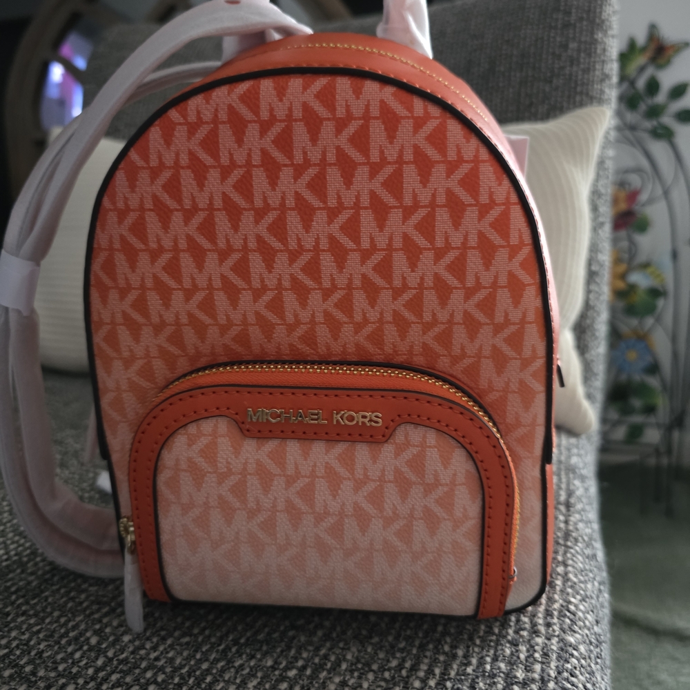 Michael Kors Coral and Peach Backpack